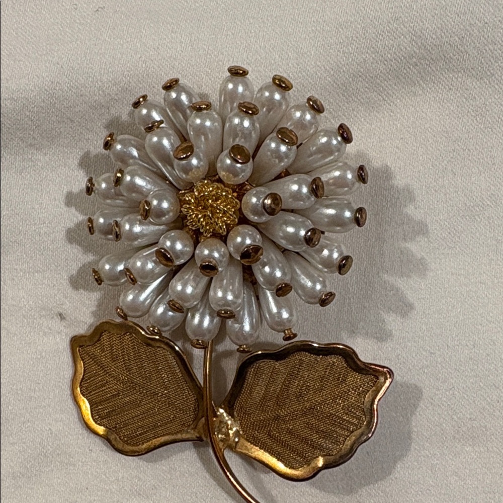 Elegant Gold and White Floral Brooch